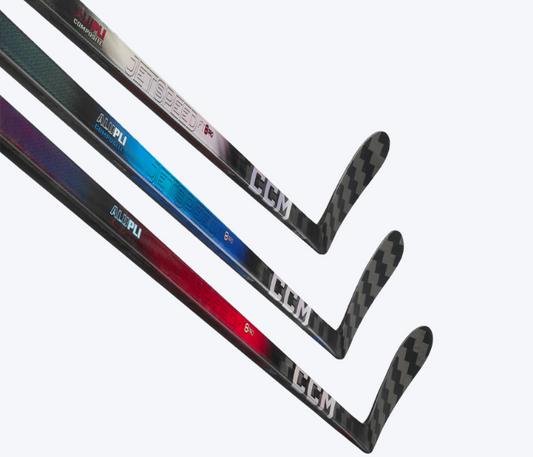CCM Jetspeed FT8 Pro colored hockey sticks in silver, blue, and red variants